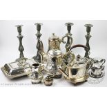 A set of four 19th century pewter push eject candlesticks, 29cm high,