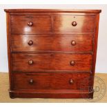 A Victorian mahogany chest of two short over three long drawers,