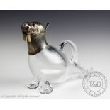 A silver topped and clear glass bodied claret jug, London 1995, in the form of a walrus,