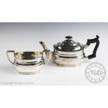 An Edwardian silver teapot and sugar bowl, William Hutton & Sons Ltd, London 1908/9,