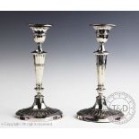 A pair of George V silver candlesticks of Adam design, Harrison Brothers, Sheffield 1917,