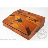 A late Victorian parquetry inlaid writing slope, in Aesthetic design,