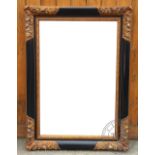 A Victorian gilt and ebony style rectangular wall mirror,