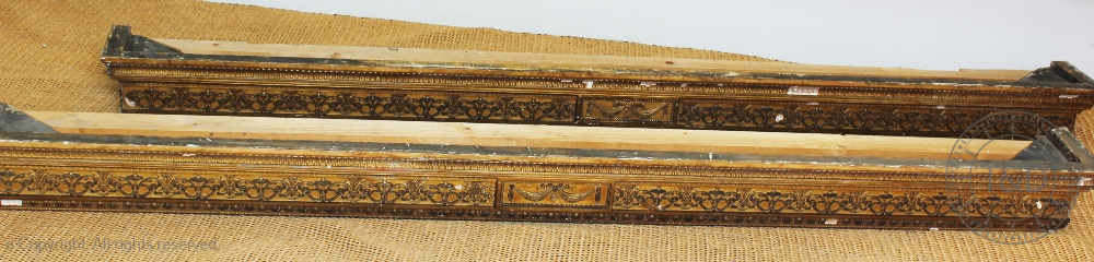 A pair of 19th century gilt wood and gesso pelmets, with egg and dart and scroll detailing,
