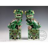 A large pair of Chinese porcelain famille verte temple dogs, Kangxi style,