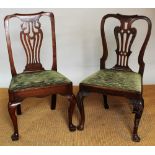 A George III walnut side chair, with pierced splat, on carved cabriole legs, 96cm H,