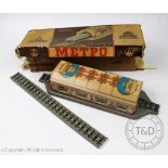A Russian tin plate metro station and track, decorated with Avtovo and one other station,