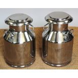A pair of stainless steel milk churns,