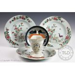 A collection of 18th century Chinese porcelain, to include; an armorial sauce boat,