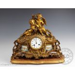 A 19th century French gilt metal figural eight day mantel clock,