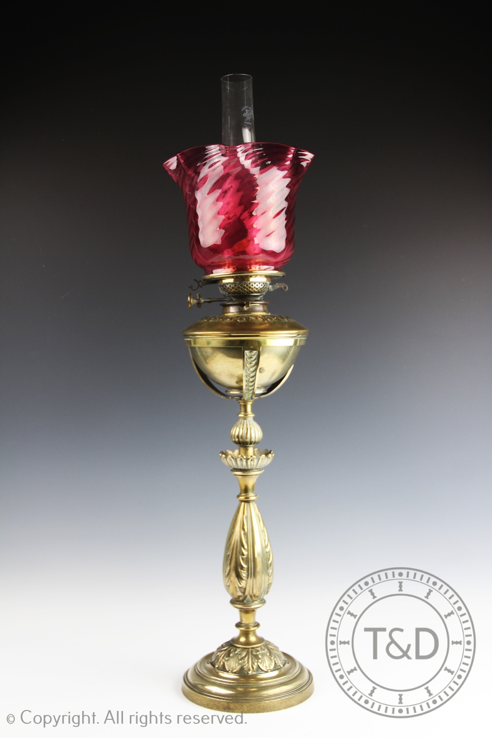 A Victorian cast brass oil lamp,