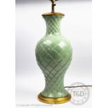 A celadon type glaze table lamp, four light, with gilt wood upper mount and base,