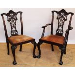 A part set of nine carved mahogany dining chairs, c1900, of Chippendale design,