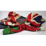 A collection of assorted flags and ensigns, to include four union flags, a St George's cross,