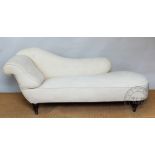 A late Victorian button back chaise long, on turned legs (in need of upholstery),