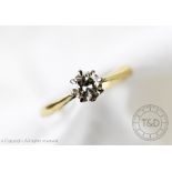 An 18ct gold solitaire diamond ring,