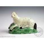A pearlware Staffordshire sheep, late 18th/early 19th century,