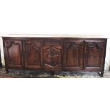 A late 18th century French oak dresser, of long proportions,