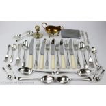 An assorted collection of silver plate to include a part canteen of Old English pattern cutlery,