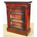 A William IV rosewood pier cabinet, with egg and dart detailing, on plinth base,