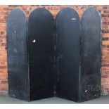 A Victorian four fold leather screen with arched top and stud detail,