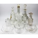 A collection of clear glass to include; a four division decanter, eight further decanters,