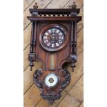 A Continental carved and stained beech wall clock, c1900,