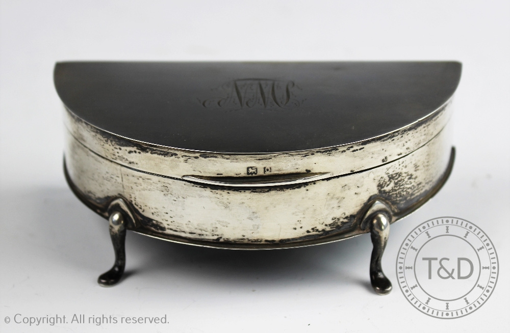 A silver semi-circular casket, Charles S Green & Co Ltd, Birmingham 1938,