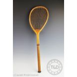 An early tilt-head lawn tennis racquet by Henry Malings of Woolwich,