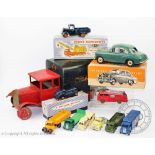 A selection of boxed and unboxed Dinky and other die cast vehicles,