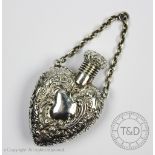 A Victorian silver heart shaped scent bottle and screw cover with suspension chain, London 1894, 6.