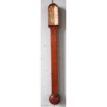 An Edwardian mahogany stick barometer, J. C.