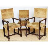 A set of eight late 19th century Carolean style oak dining chairs,