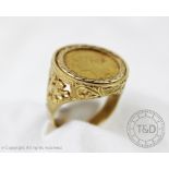 A Victorian gold half Sovereign dated 1880, set within 9ct yellow gold ring mount, gross weight 10.
