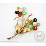 A yellow metal and semi-precious stone set spray brooch,