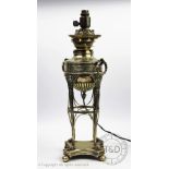 A 19th century silver plated oil lamp, converted for electricity, in Adam style,