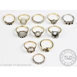 Eleven vacant ring mounts, in white and yellow metal, hallmarked as 18ct gold or stamped '18ct', 35.
