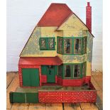 A large vintage dolls house of 1930's style,