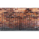 A pair of wrought iron gates, each 121cm H x 95.