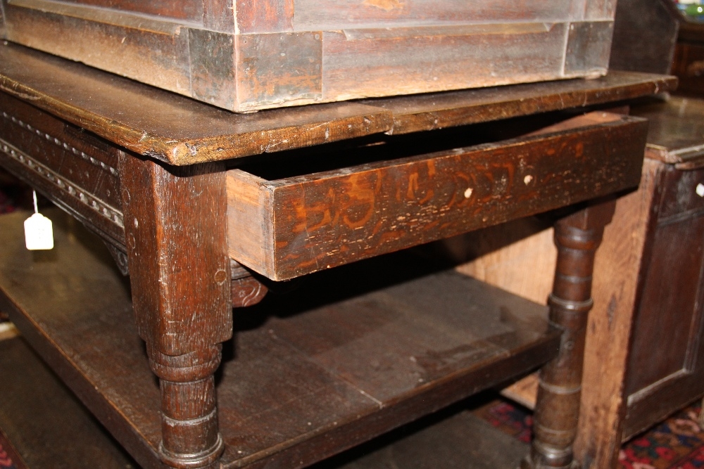 An 18th century and later oak three tier table, with side drawer, on turned legs, - Image 6 of 21