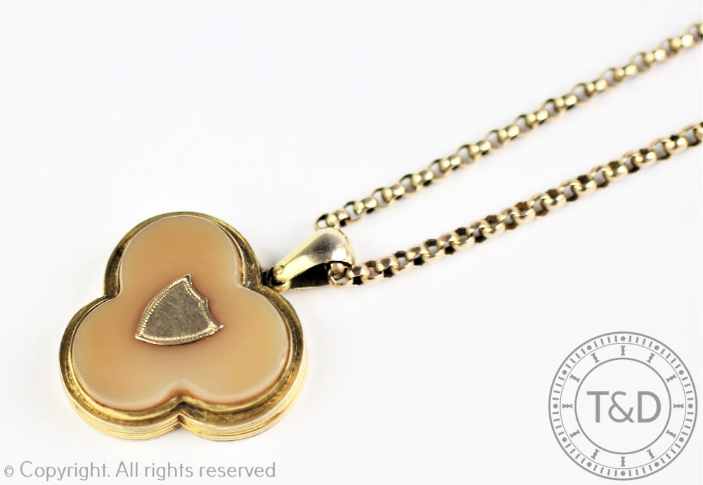 A Victorian trefoil shaped locket, inset with onyx and a vacant shield shaped vacant cartouche, - Image 2 of 2