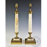 A pair of 19th century style marble and brass mounted lamp bases,