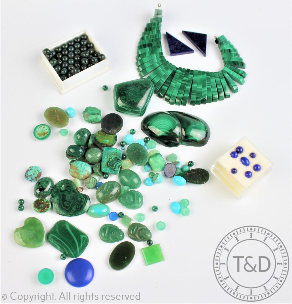 A collection of un-mounted opaque green, blue and black coloured stones, to include; malachite,