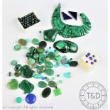 A collection of un-mounted opaque green, blue and black coloured stones, to include; malachite,