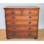 An early 19th century and later oak and mahogany crossbanded chest,