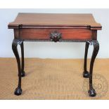 An early 20th century mahogany card table, in the American Federal manner,