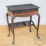 An Anglo Indian carved hardwood campaign style writing table,