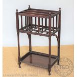 An Edwardian mahogany Canterbury what-not, with three section upper section below an under-tier,