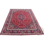 A Persian hand woven wool carpet,