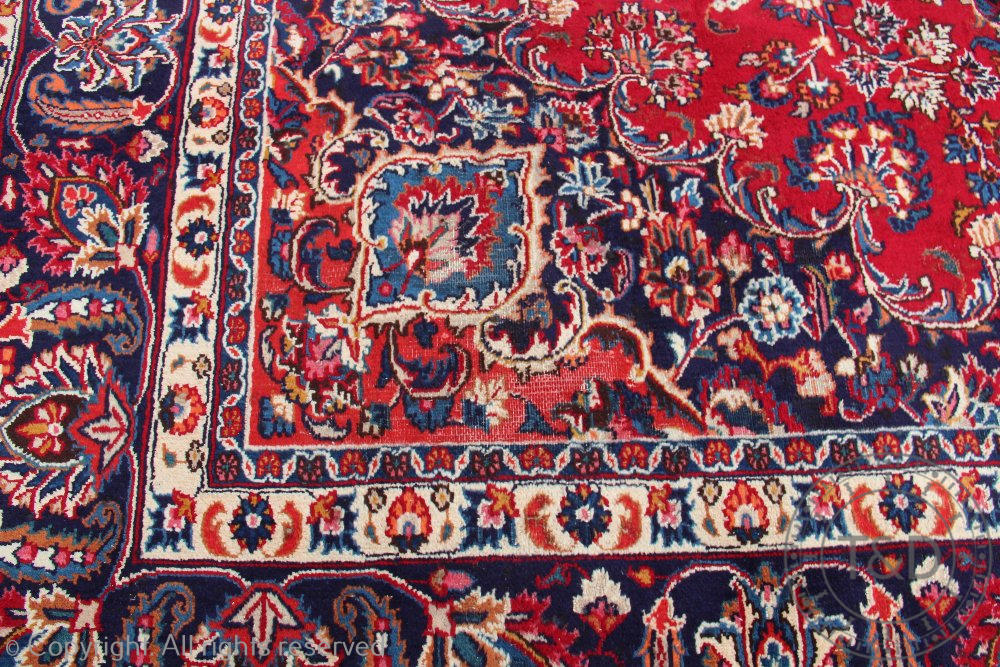 A Persian hand woven wool carpet, - Image 2 of 4